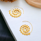 A royal spin earrings