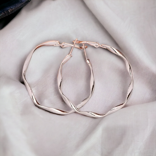 Twisted by nature hoop earrings