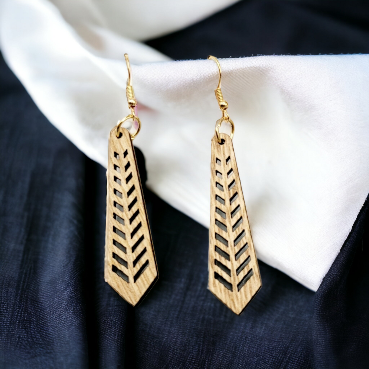 Growing in capitol earrings