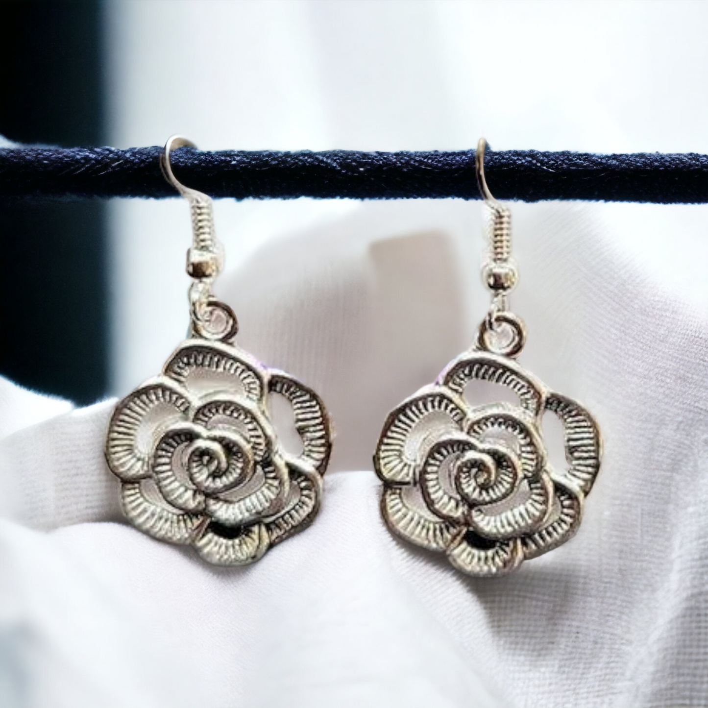 Silver rosette earrings