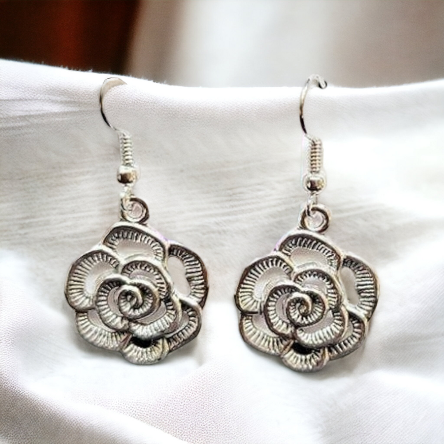 Silver rosette earrings