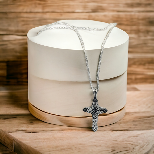 Scrolled cross necklace