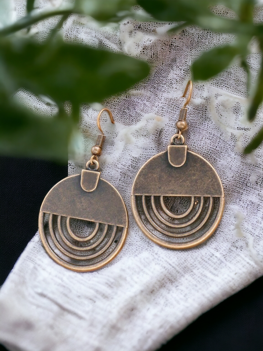 A copper statement earrings