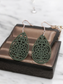 Ornately carved earrings