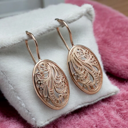 Scrolled adornments earrings